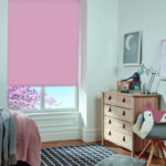 bright blush pink blackout roller blind in child's bedroom