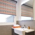 roller window blind with grey/orange zig zag pattern