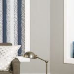 vertical window blinds with alternating blue/white pattern